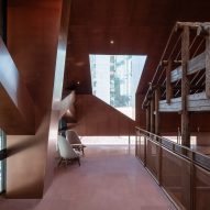 Neri&Hu incorporates historic wooden structure into copper-clad tea rooms