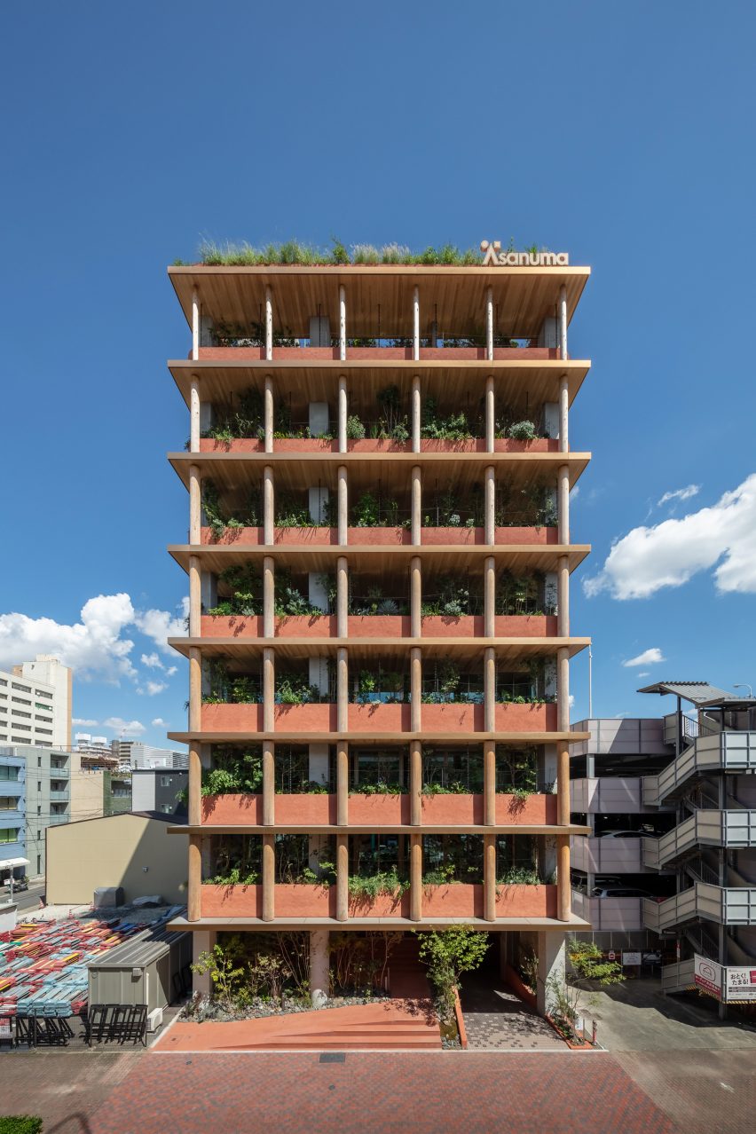 dezeen.com - Nori Architects adds cedar-log columns to Good Cycle Building