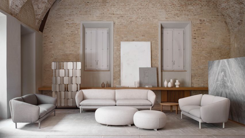 Three Not Sofas by True Design in a neutral-toned living space with brick wall