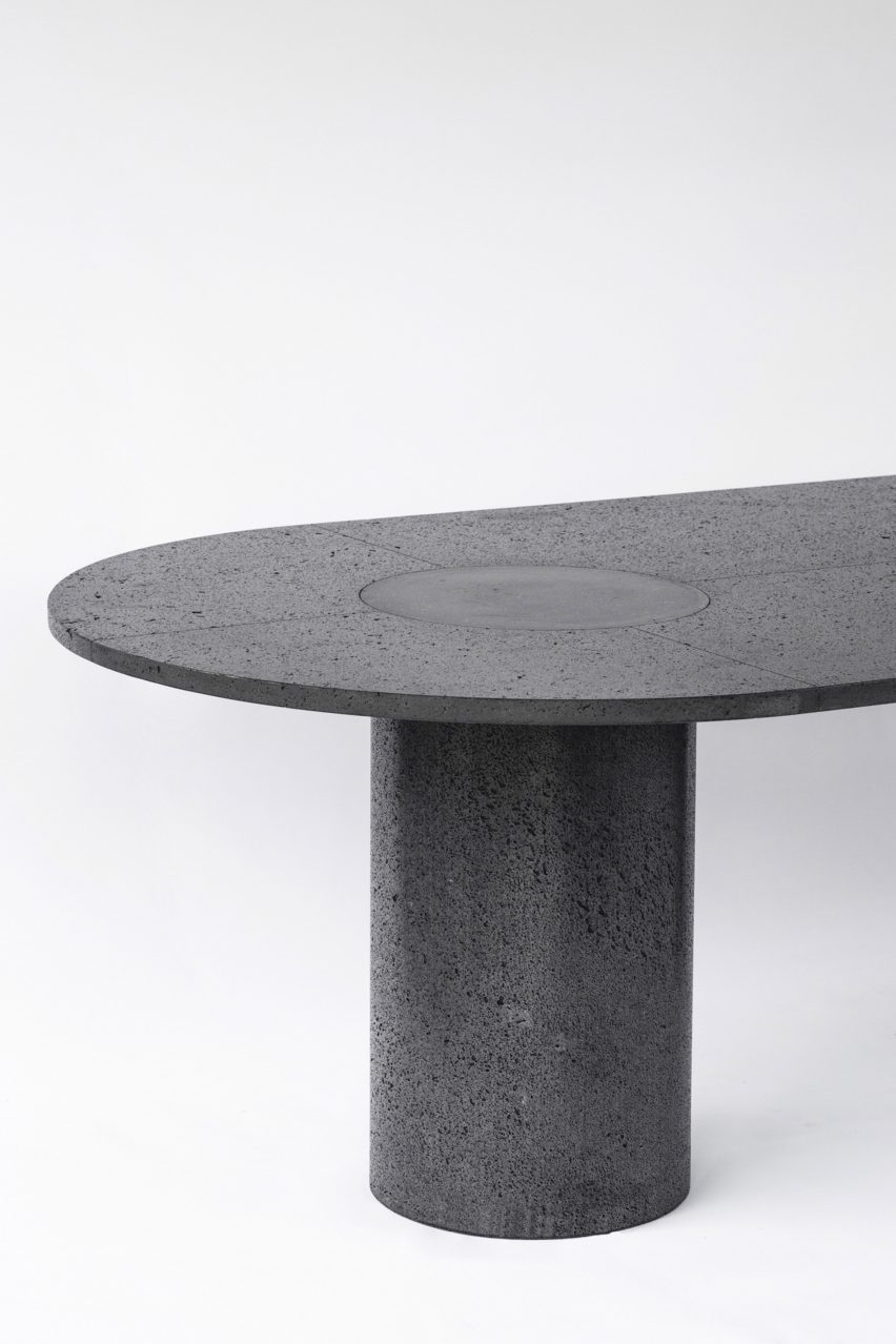 Image of the table top and legs of the stone furniture