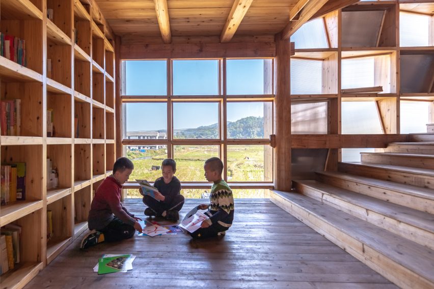 Children sitting on the floor reading in Condition_Lab's Pingtan Book House