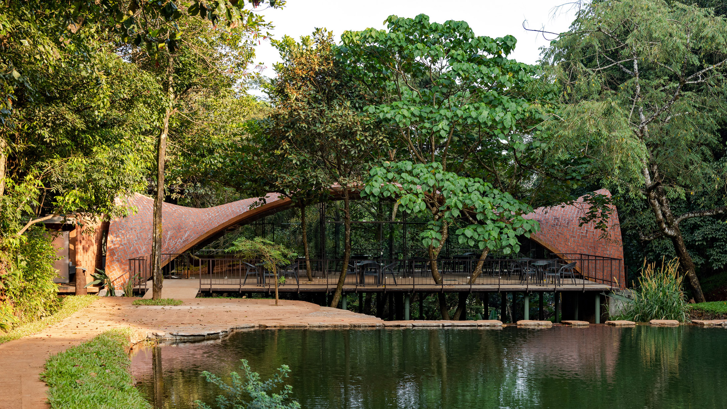 Play Architecture tops resort restaurant in India with undulating tiled roof - Vimarsana News