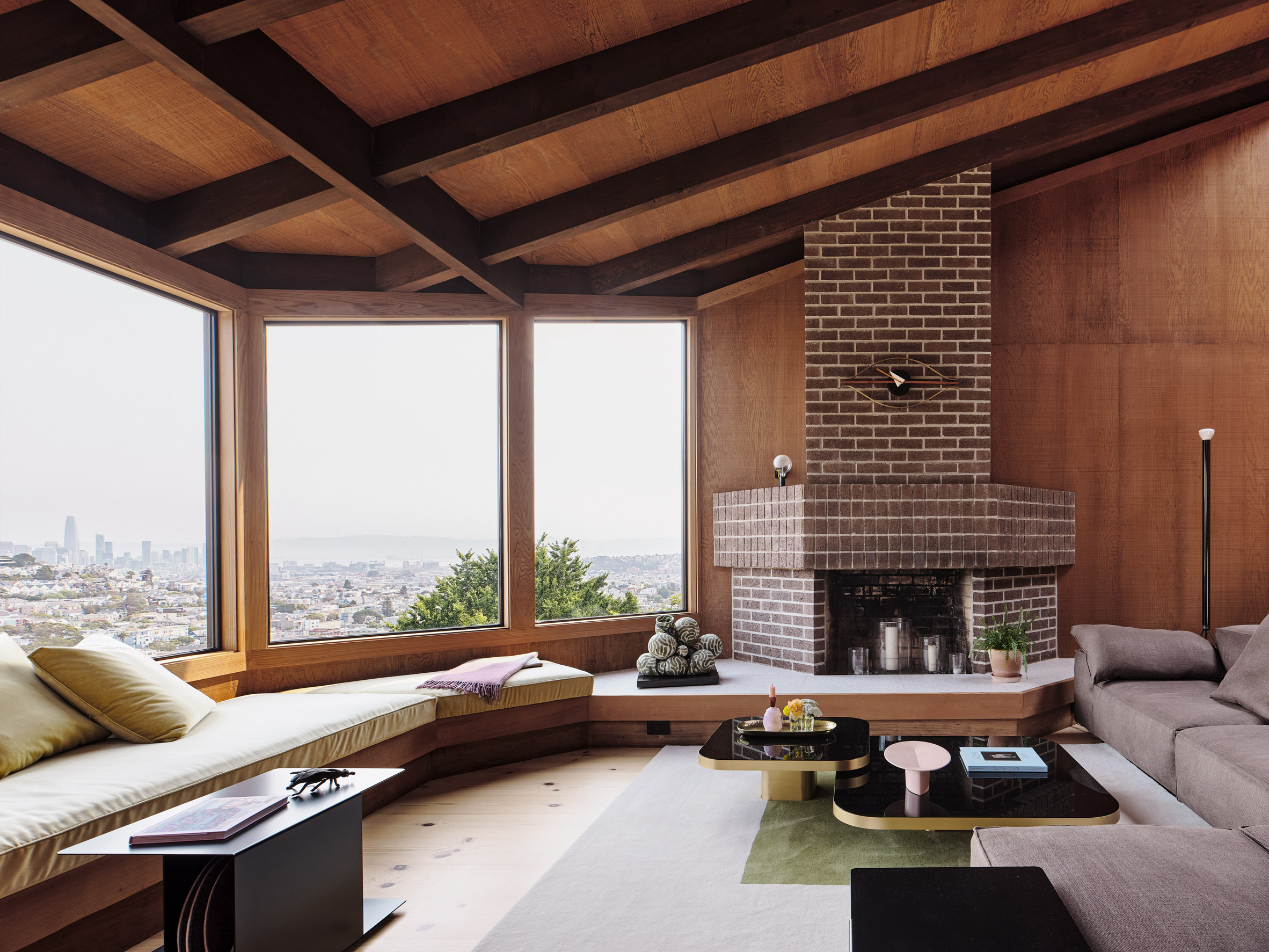 Brick fireplace with views of San Francisco and wrap-around seating