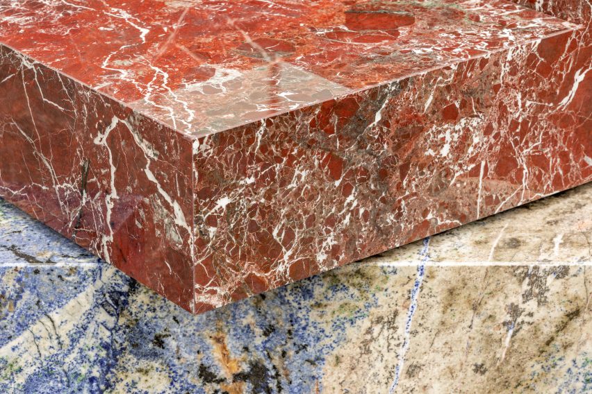 Large blocks of red and blue natural stones in installation by Sabine Marcelis