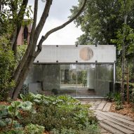 Fala Atelier nestles "very tiny palazzo" in garden of Porto home