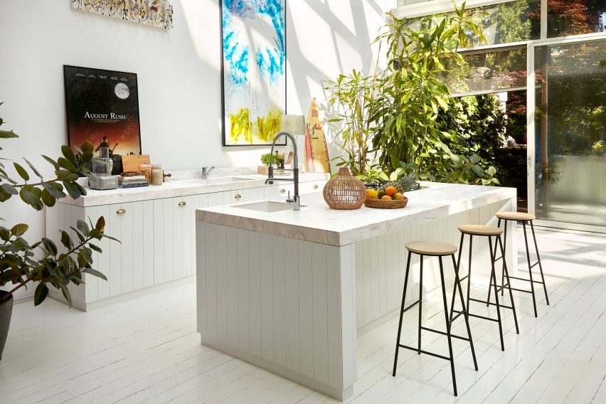A photograph of a kitchen featuring Corian surfaces