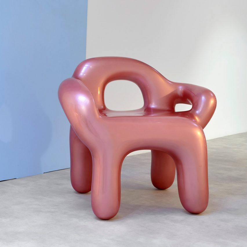 Photo of a pink chrome armchair