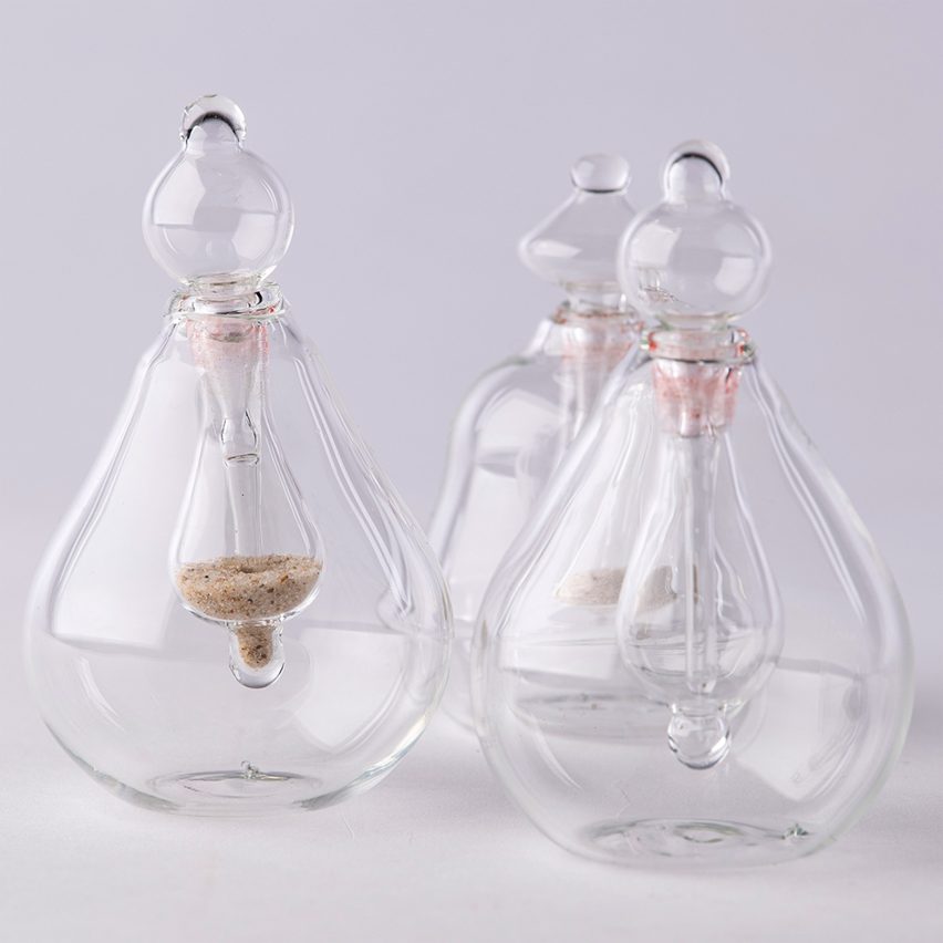 Photograph showing glass flasks with stoppers