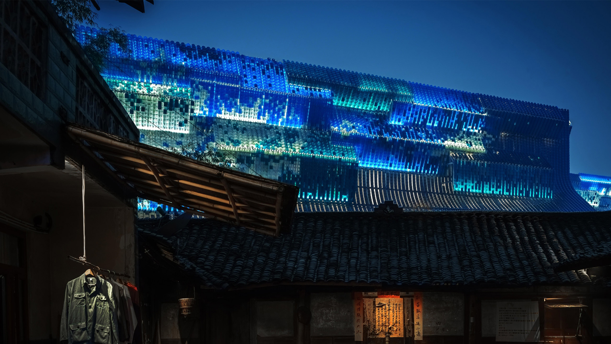 Immersive theatre clad in luminous tiles by Beijing Leuchte Lighting Design - Vimarsana News