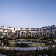 BIG unveils spiral-shaped modular housing development in Aarhus