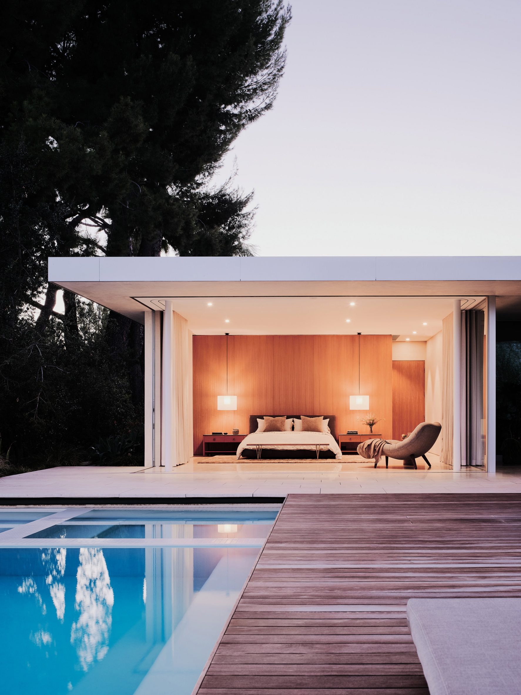 Bedroom facing pool in Clear Oak Residence by Woods + Dangaran