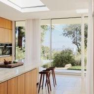 Kitchen in Clear Oak Residence by Woods + Dangaran
