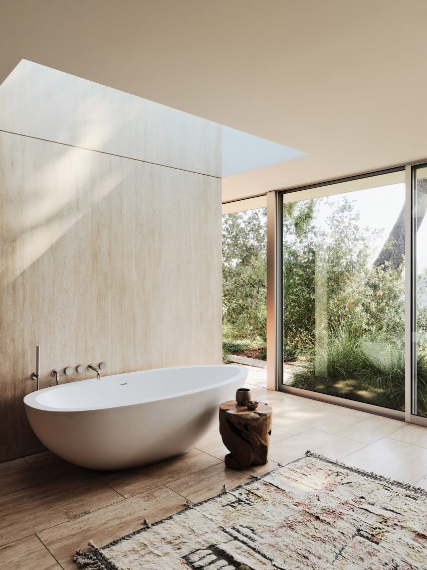 Skylight above bathtub in Clear Oak Residence by Woods + Dangaran