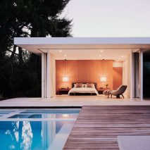 Bedroom facing pool in Clear Oak Residence by Woods + Dangaran