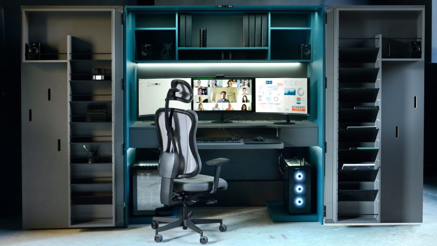 An office chair is pictured beside the Dizzone workstation