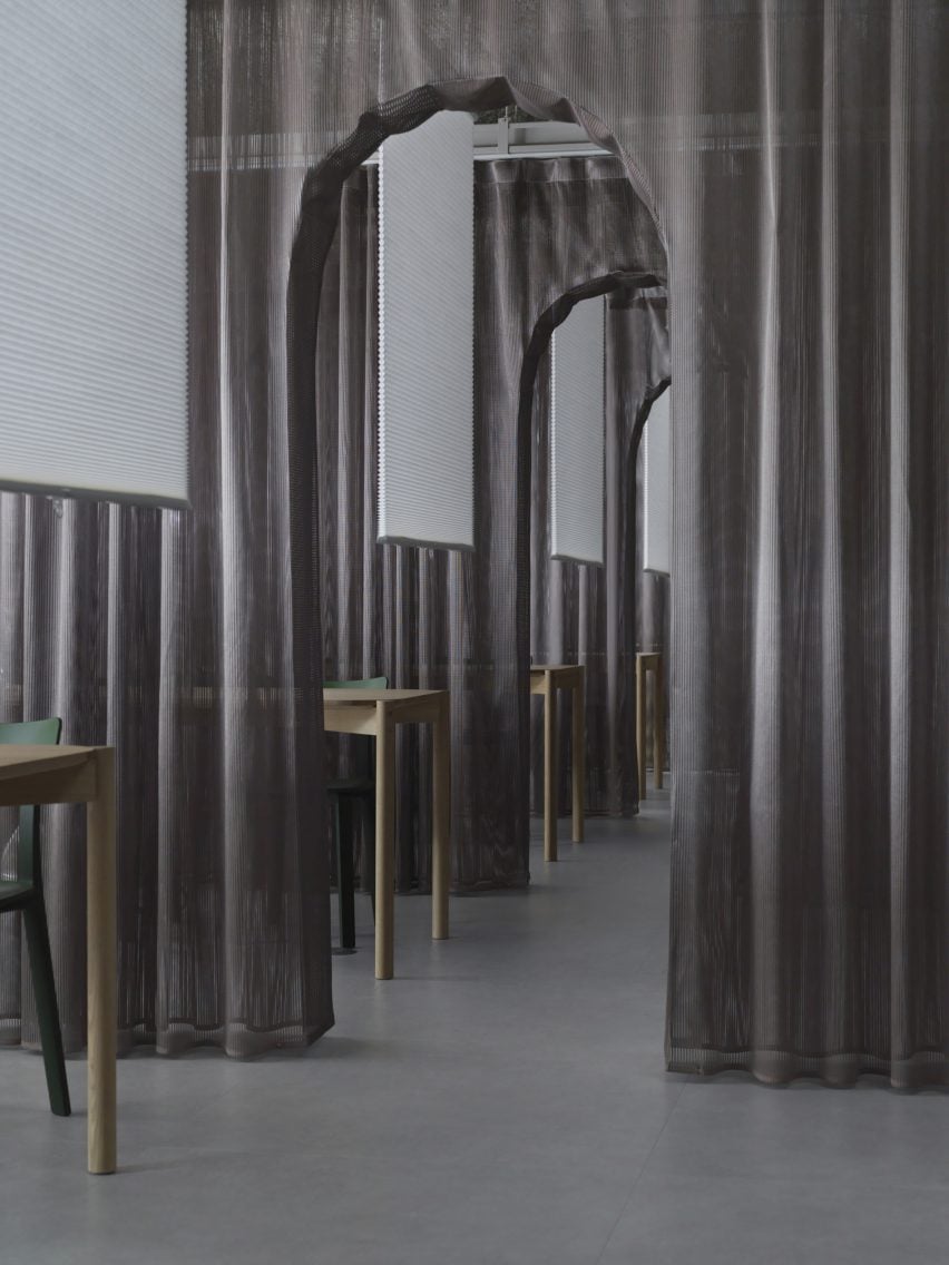 Interior image of mesh curtains at PROUD Gallery Gotanda
