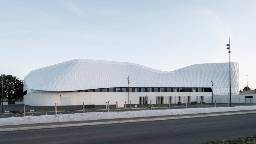 Sports centre with white aluminium facade