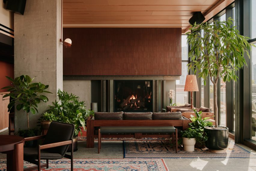 Lounge arranged around large fireplace
