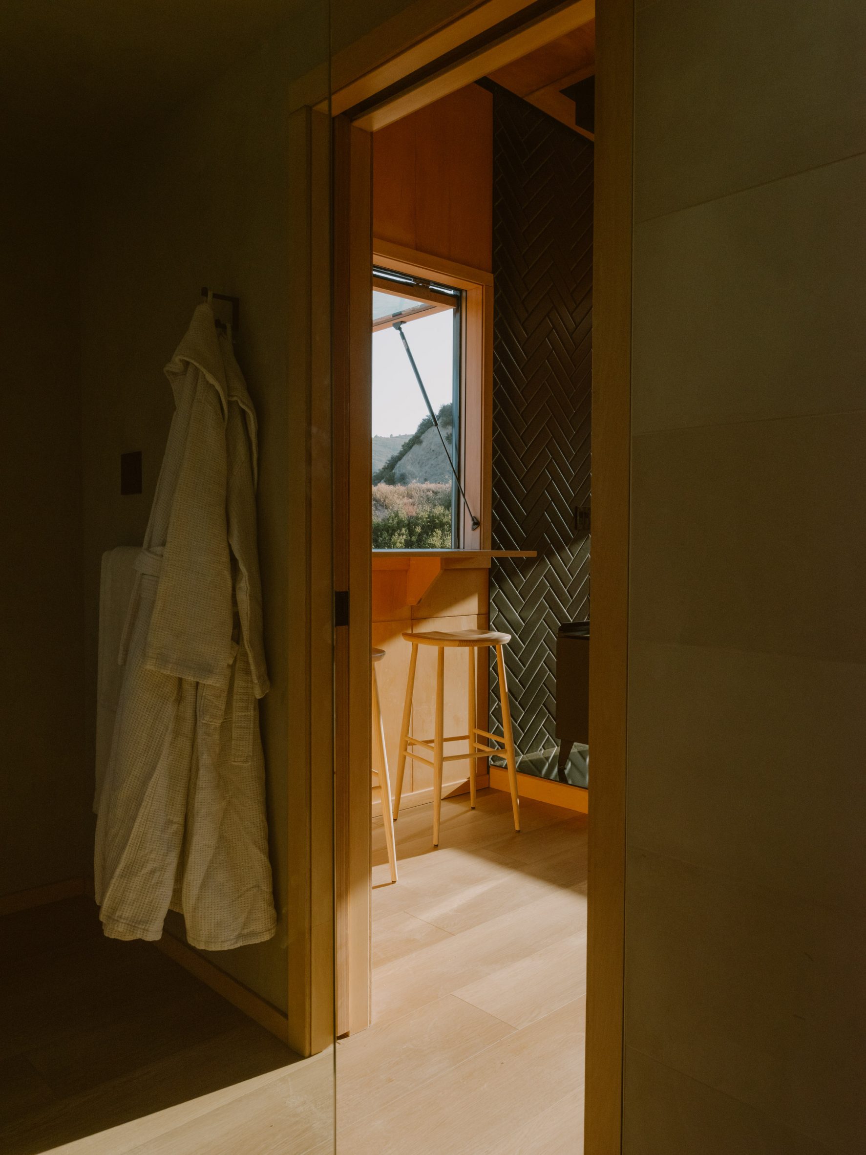 Window and bathrobe in micro cabin