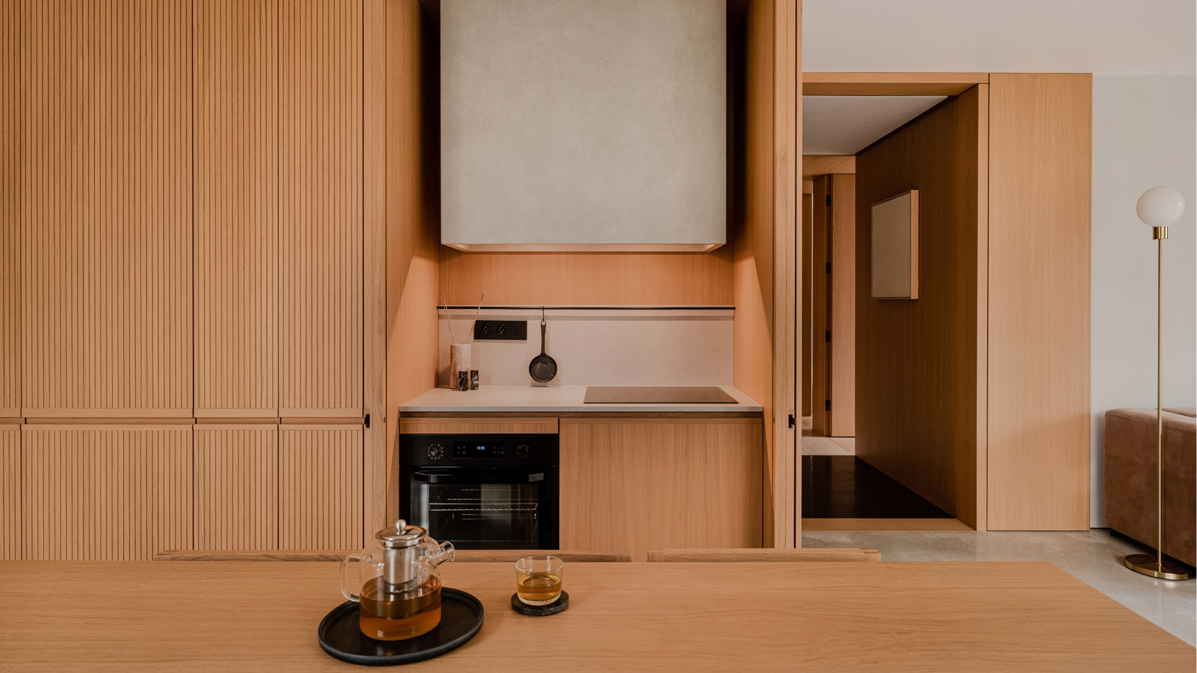 Timber joinery "gently cocoons" inhabitants in Gdańsk apartment by ACOS - Vimarsana News