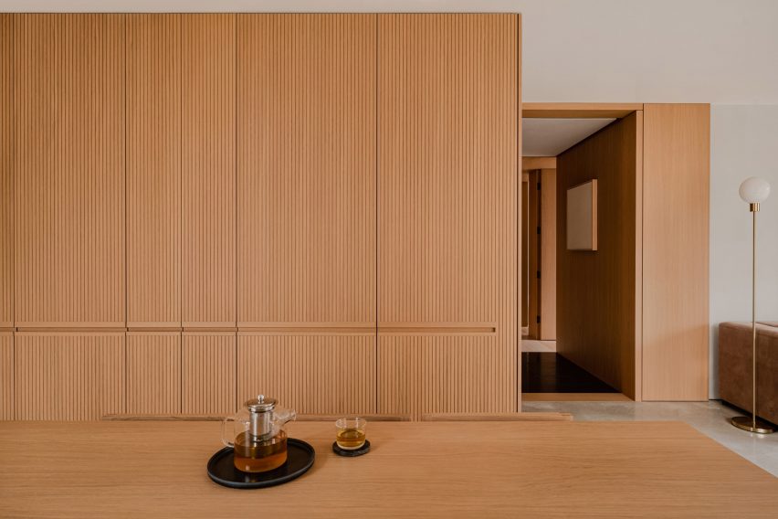 TImber-clad kitchen of Gdańsk home interior by ACOS