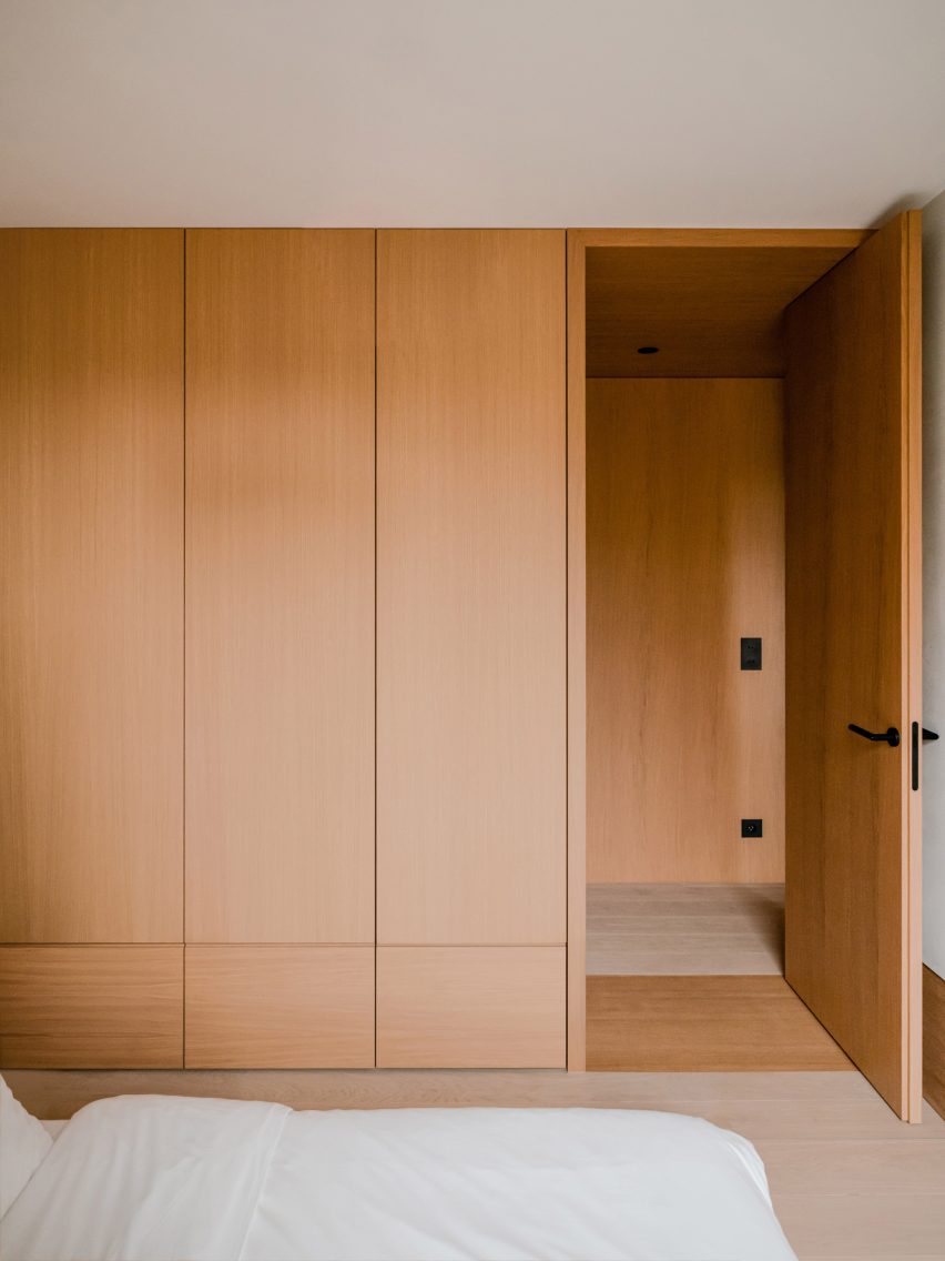 Full-height timber wardrobe in The Hideaway Home, Gdańsk