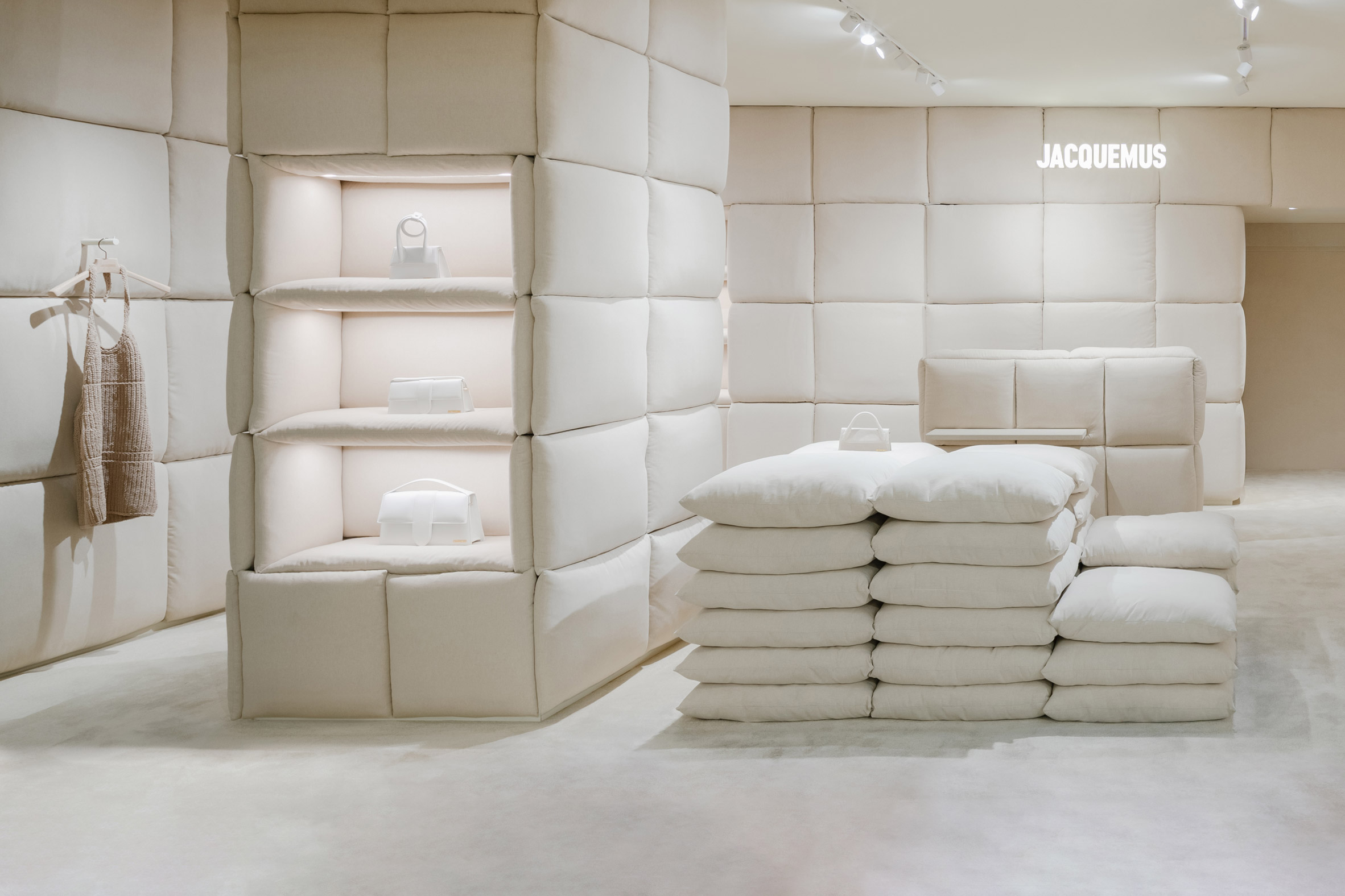 A store interior filled with cream pillows