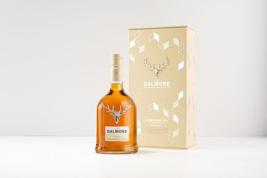 A bottle of The Dalmore whisky and a case