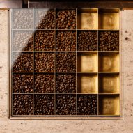 coffee beans stored in display unit inside stone counter top