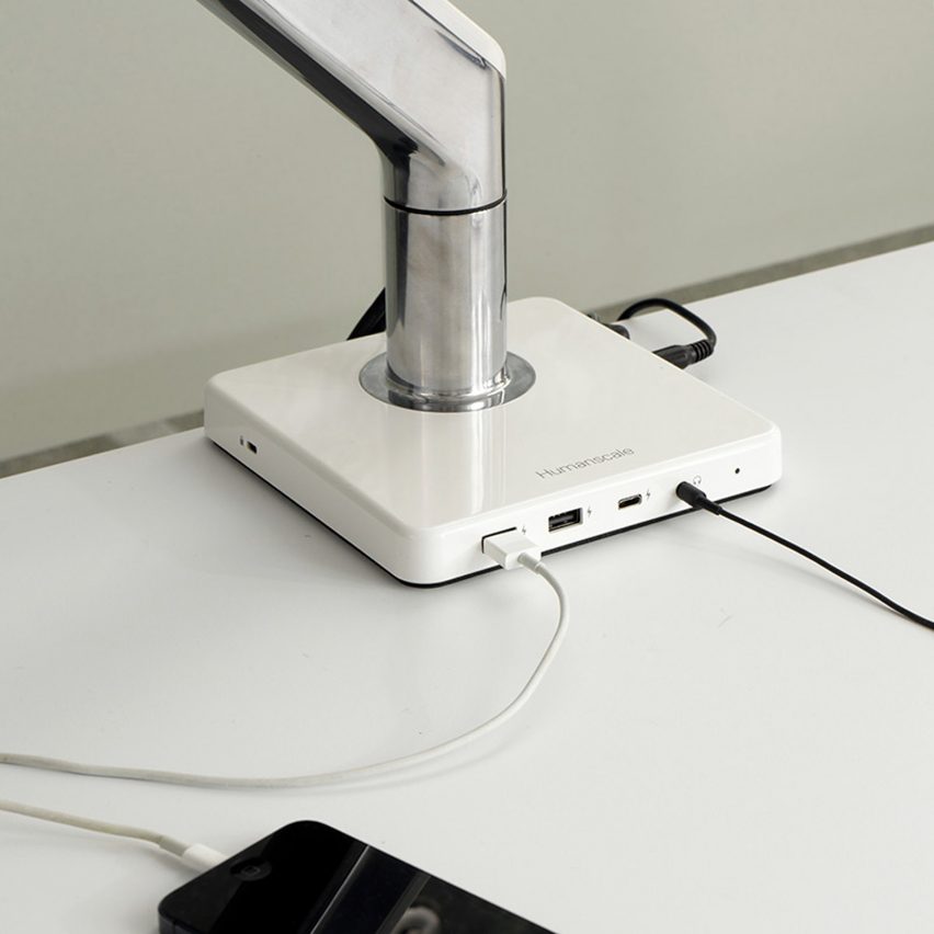 White object on desk with USB ports