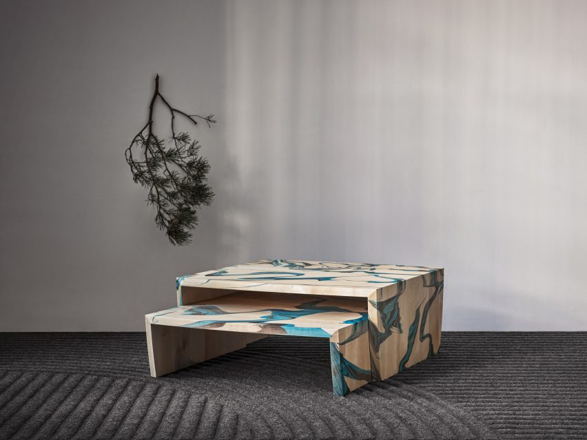 Wooden table with blue swirl pattern