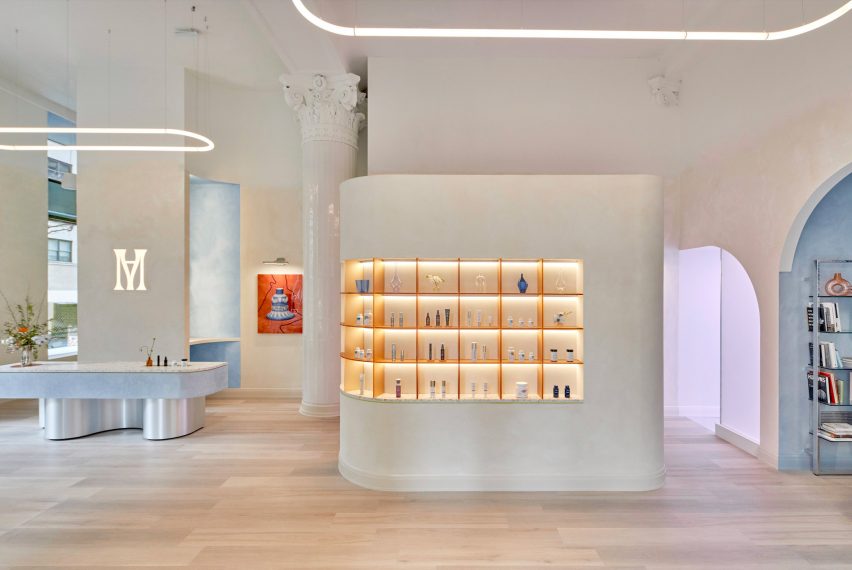 Retail area of the Modern Age studio with orange resin display shelves