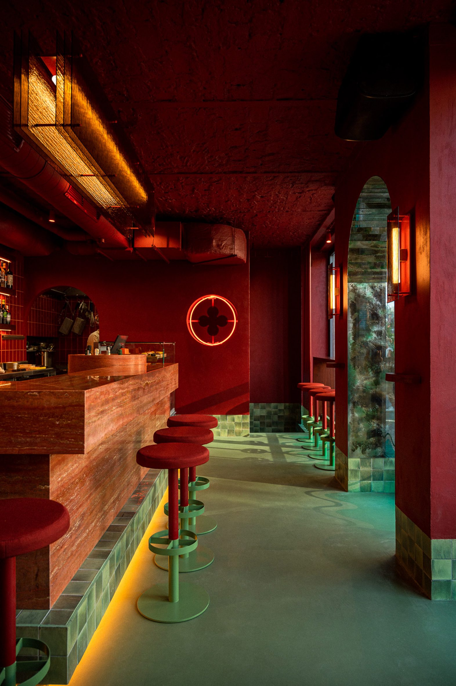 Va Bene Cicchetti bar in Warsaw by Noke Architects with all-red interior and turquoise floors
