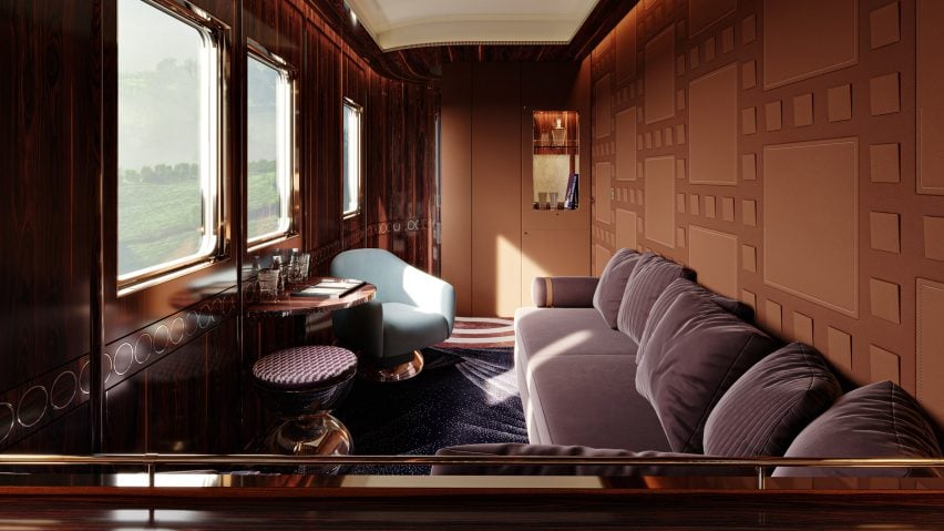 Interior of boarding suite with a four-seater sofa, single armchair and small writing desk