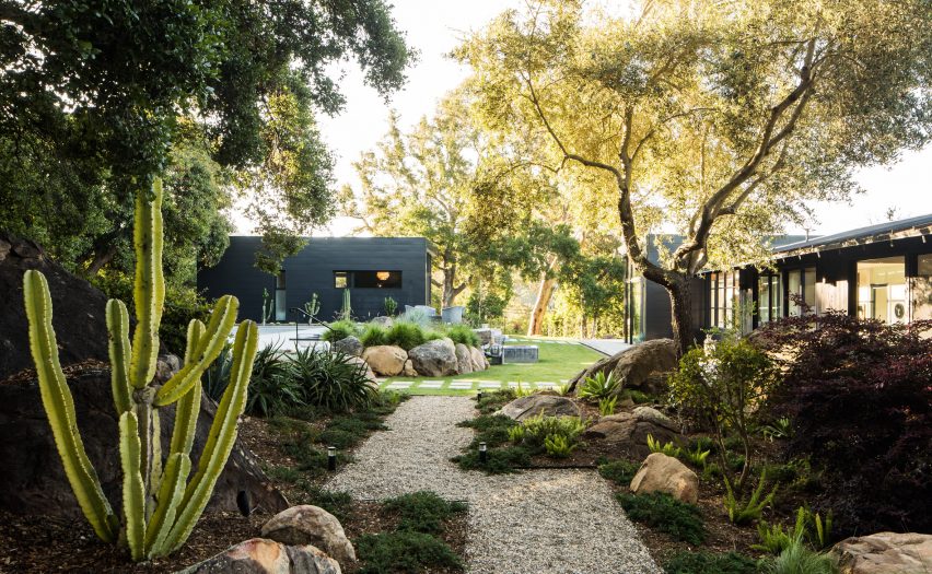 Path leading to home in California with cactuses