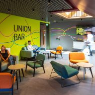 Interior of One Elmwood student hub at Queens University in Belfast by Hawkins\Brown and RPP Architects