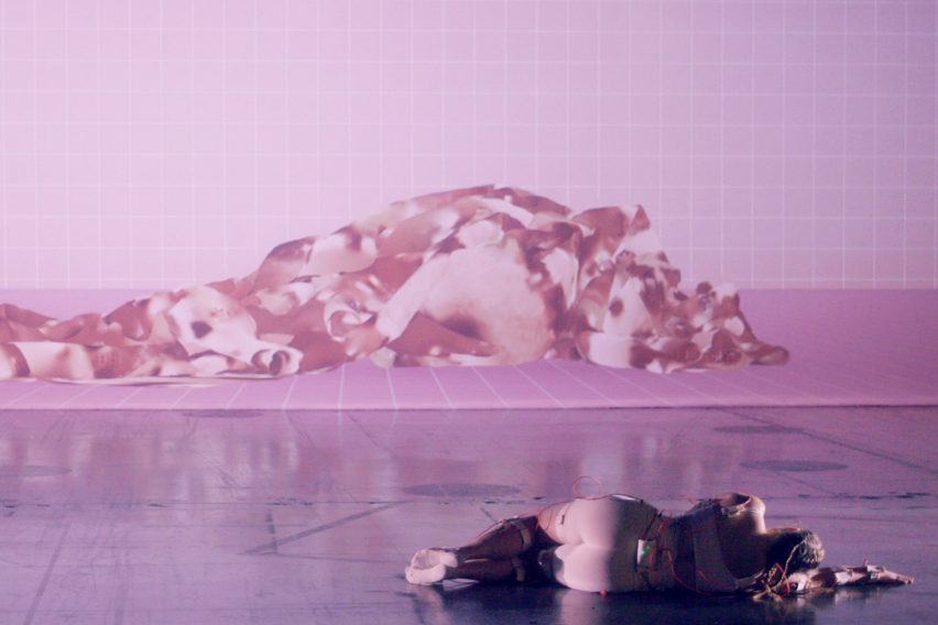 Pink-toned digital image of a person lying down by a SCI-Arc student