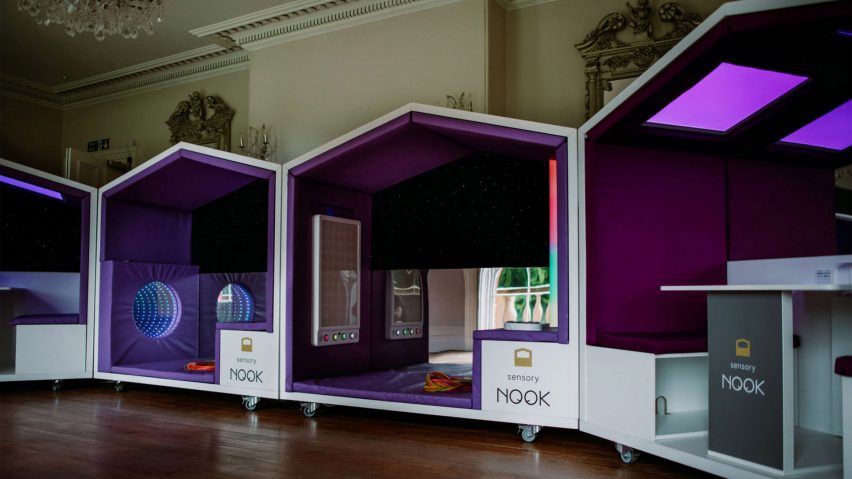 Photograph showing a row of sensory pods in high-ceilinged room