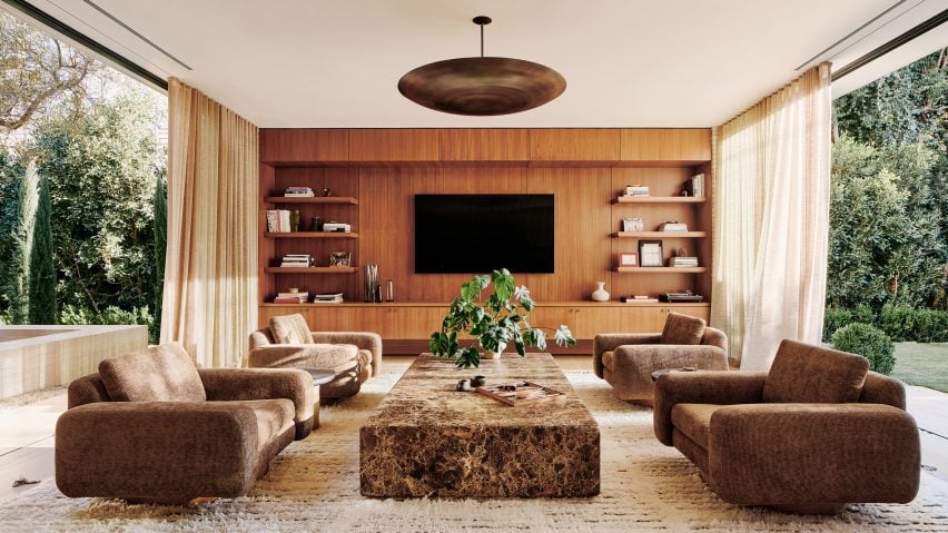 Family lounge in Twentieth house by Woods and Dangaran with warm neutral colour palette