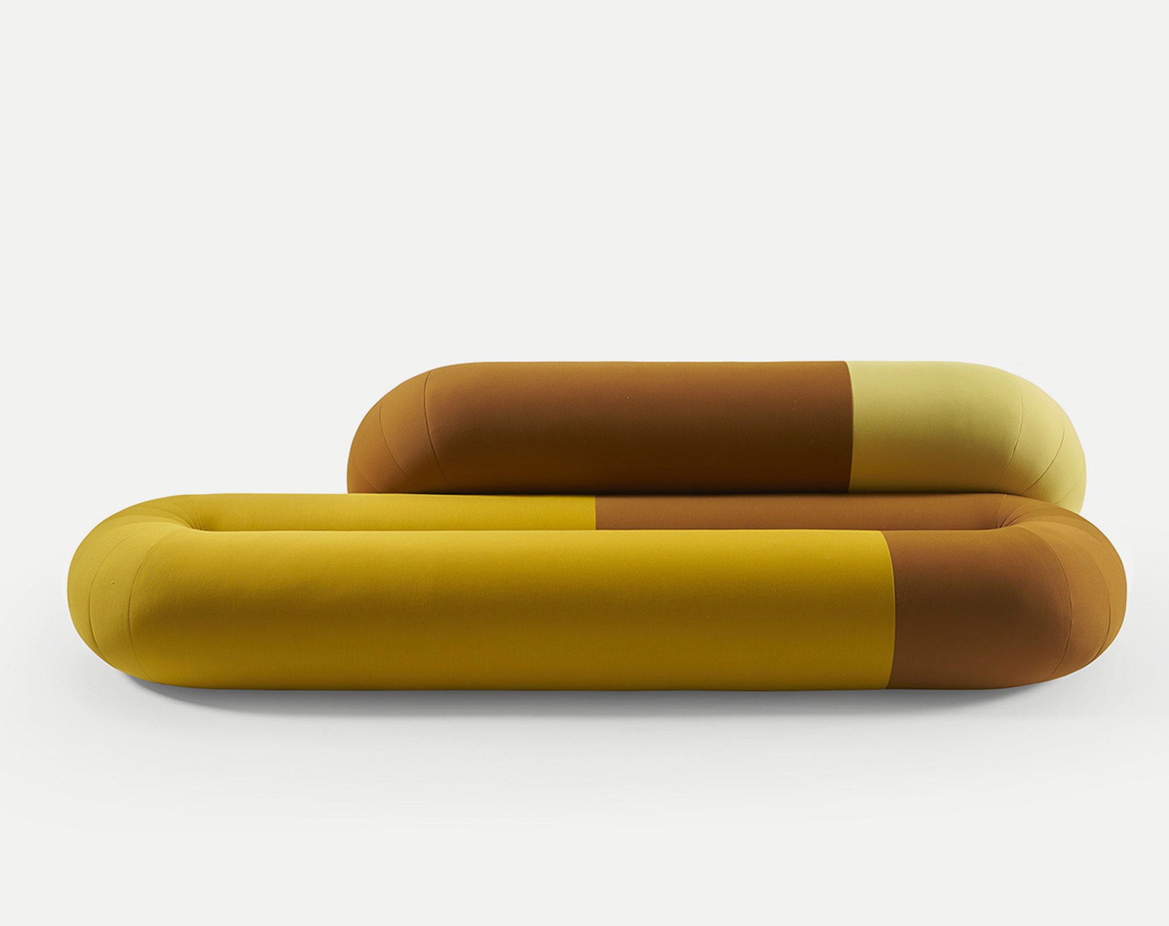 Loop sofa in a mustard, yellow and brown colour