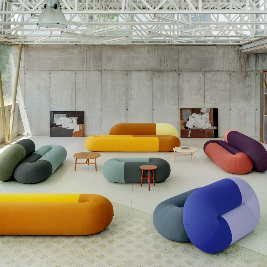 Multicoloured seating displayed in an interior, featuring various colours and sizes