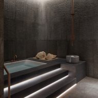 Studio N highlights textured materials with lighting at Dubai spa