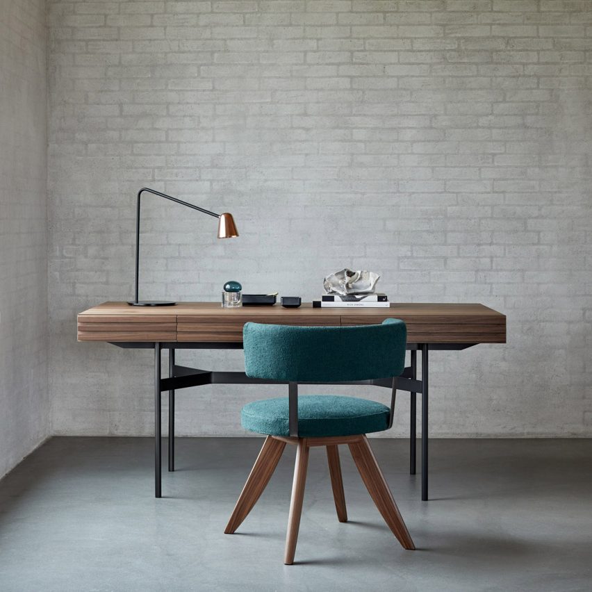 Photo of a wooden desk and green chair