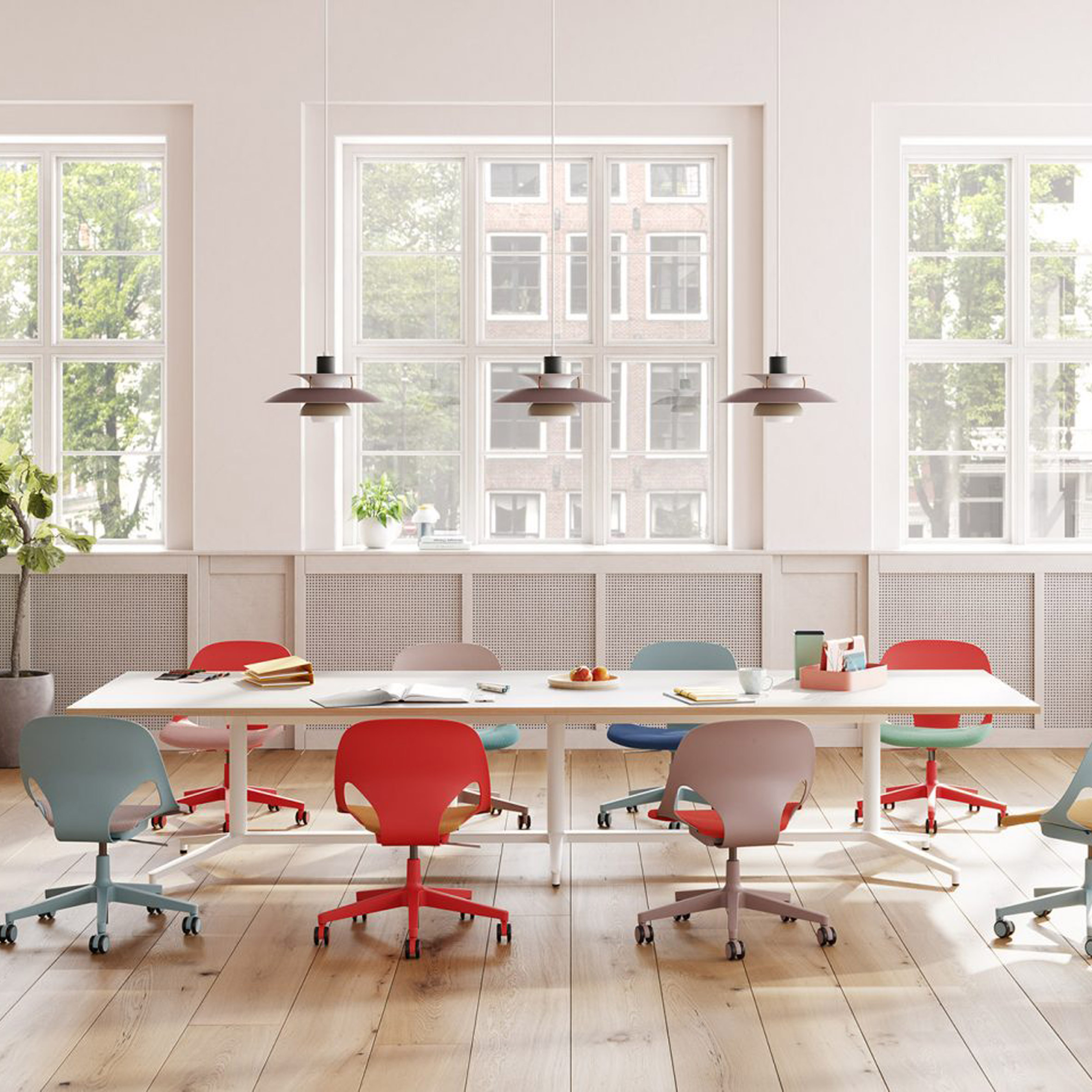 Photo of colourful chairs and white table