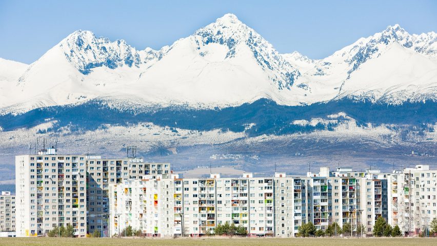 Photo of buildings and mountains