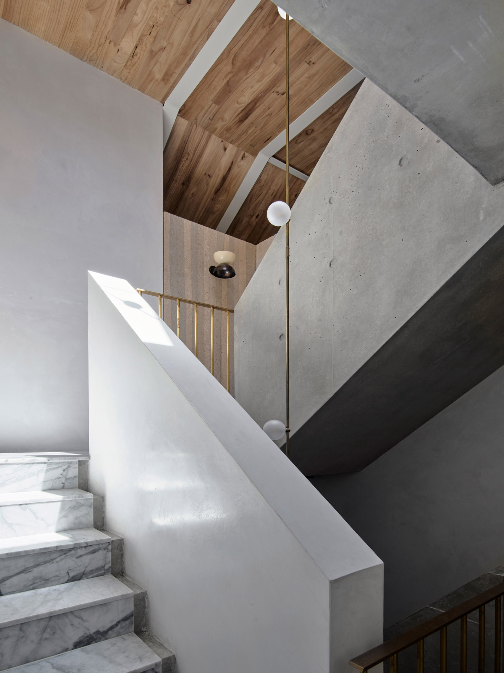 Concrete stairwell with marble steps