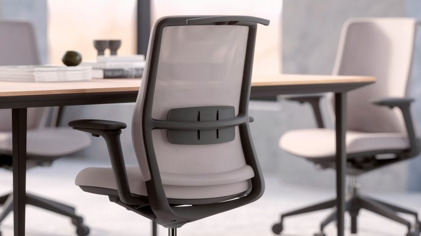 Grey office chairs around table
