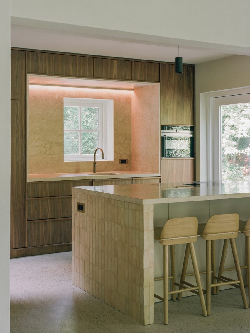 Interior image of a tiled kitchen with island at the Dutch home