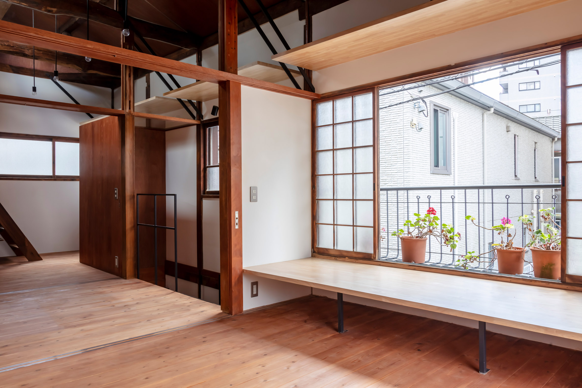 Japanese home with shelving and open window