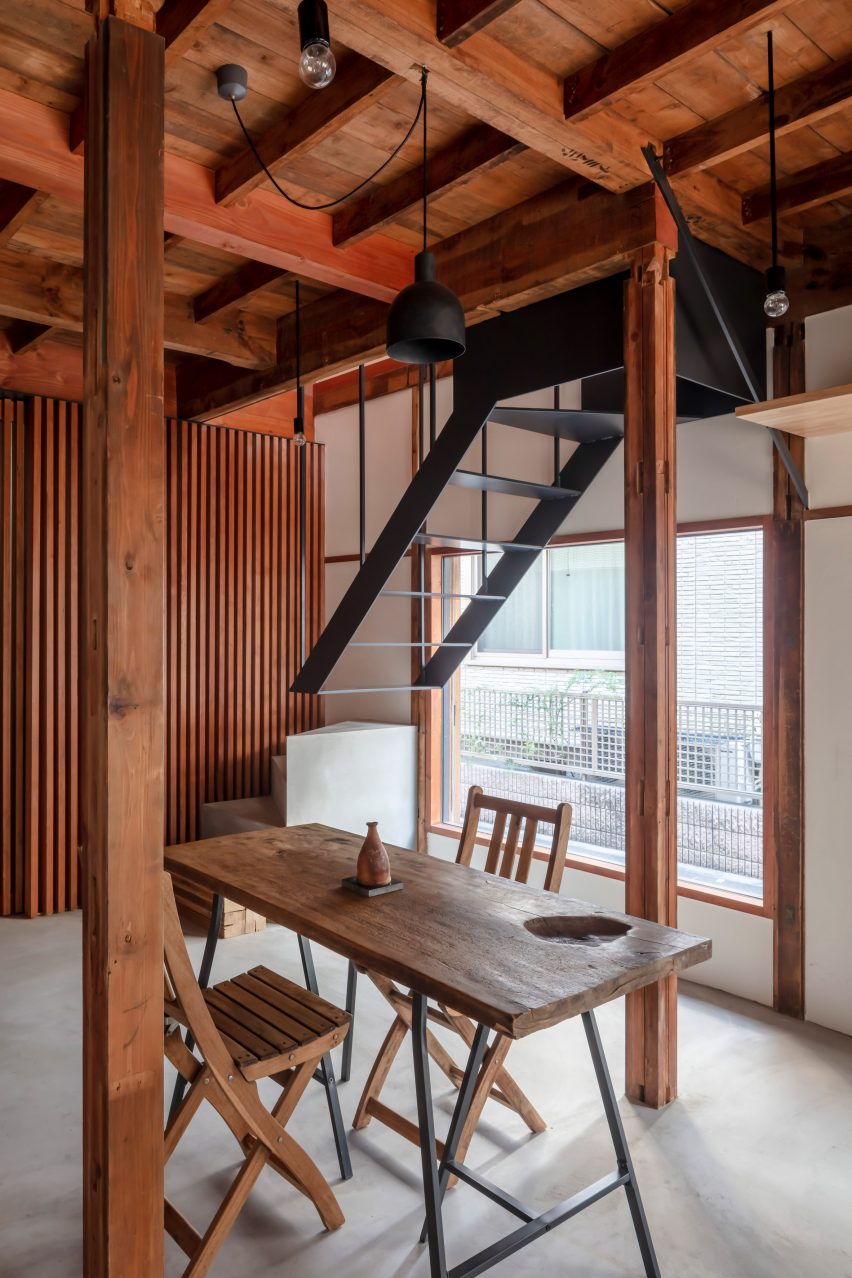 Cedar beams and floating staircases tokyo home